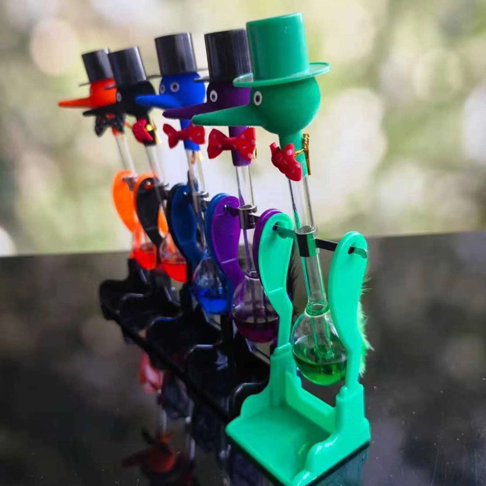 Creative Non-stop Liquid Drinking Glass Lucky Bird Duck Bobbing Magic