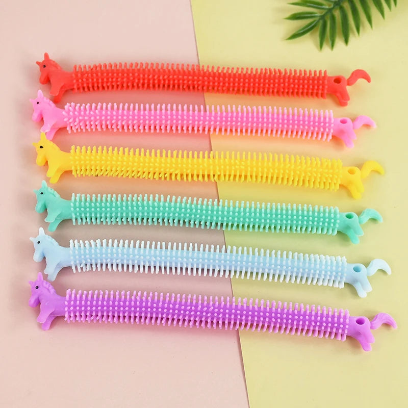 6- Funny Unicorn Pull Worm Stretch String TPR Rope Kids Birthday