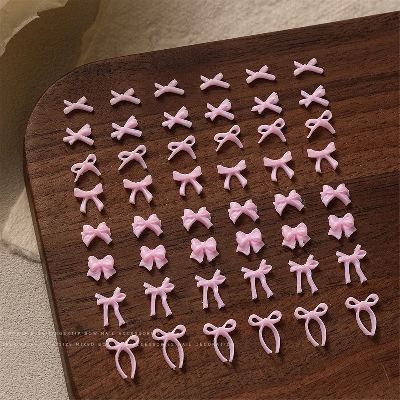 50pcs Sweet Pink Bowknot 3D Nail Art Decorations Mini Resin Ribbon Nail Rhinestones Charms Nail Accessories Manicure DIY Zpaxo