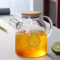 1/1.8L Transparent Borosilicate Glass Teapot Heat-Resistant Large Clear Tea Pot Flower Tea Set Puer Kettle Cup Office Home Tool Zpaxo B 1800ML