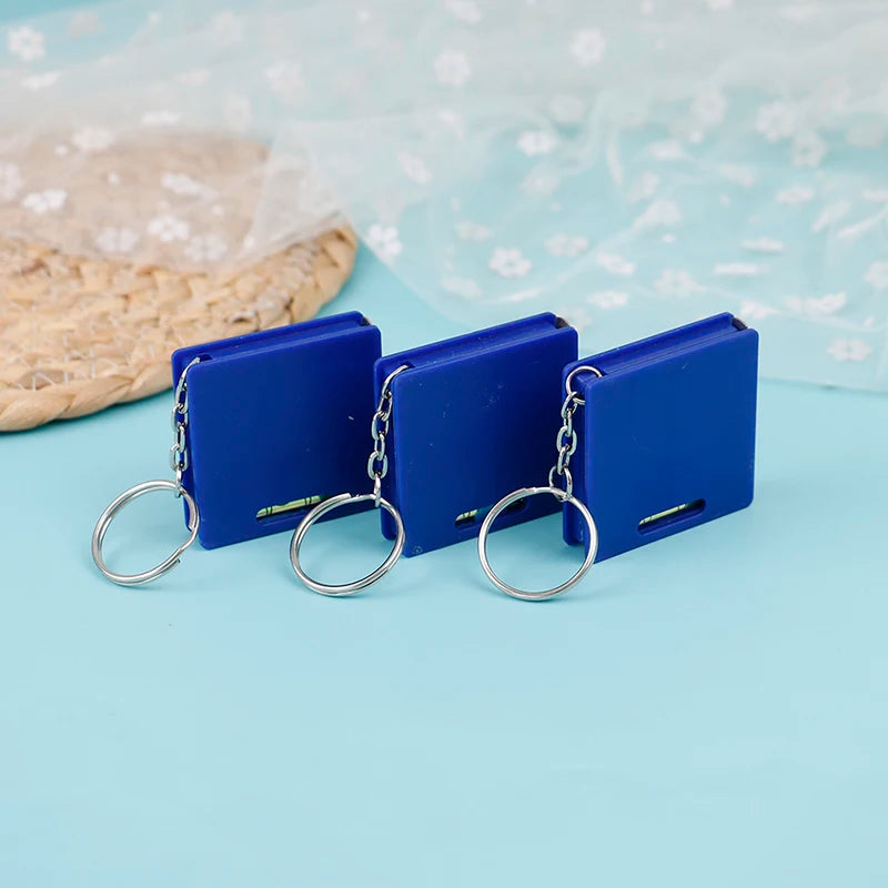 1M Mini Tape Measure Keychain With Horizontal Bubble Plastic Portable Retractable Ruler Centimeter/Inch Tape Measure 4.3*4.3*1cm Zpaxo
