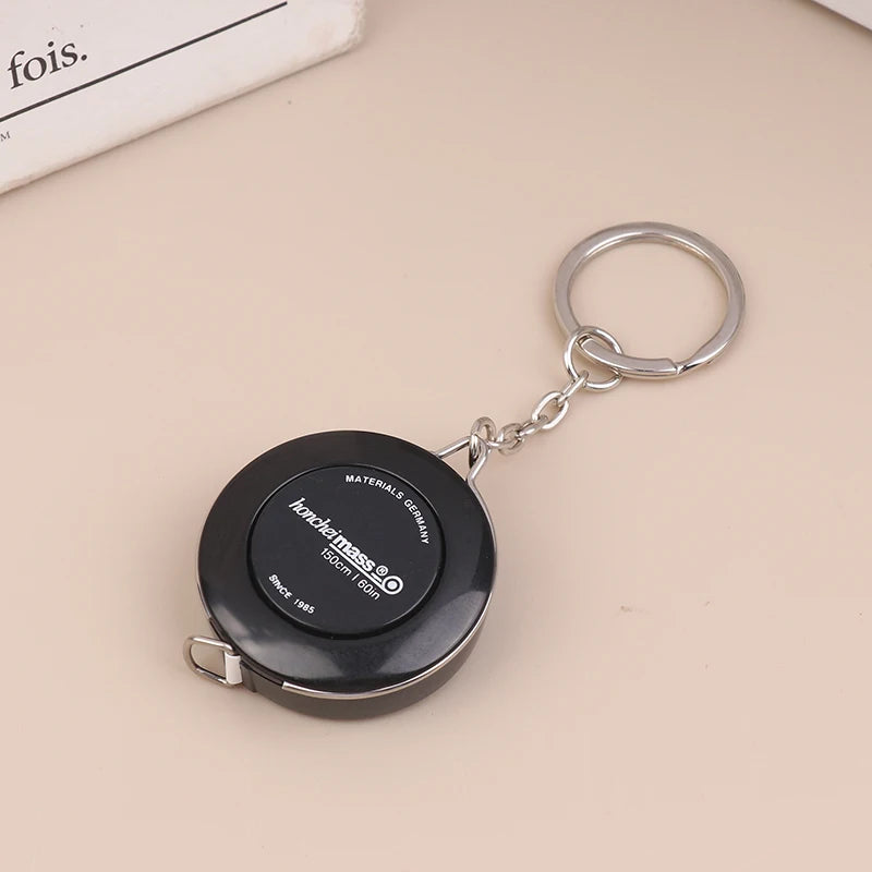 Mini ABS Plastic Measure Ruler Centimeter Inch Roll Tape 150/60Inch Keychain Tape Measure Portable Retractable Measuring Tool Zpaxo Black