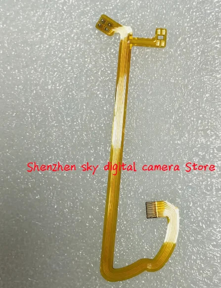 Olympus 50-200 Lens Aperture Cable 55- Flex Good Camera Repair Part