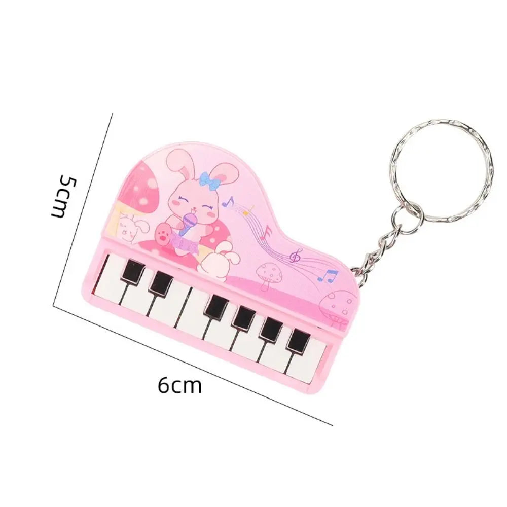 Solid Color Mini Electronic Piano Keychain Bear Rabbit Mini Piano Key Pendant Animals Audible Musical Instrument Piano Keyring Zpaxo