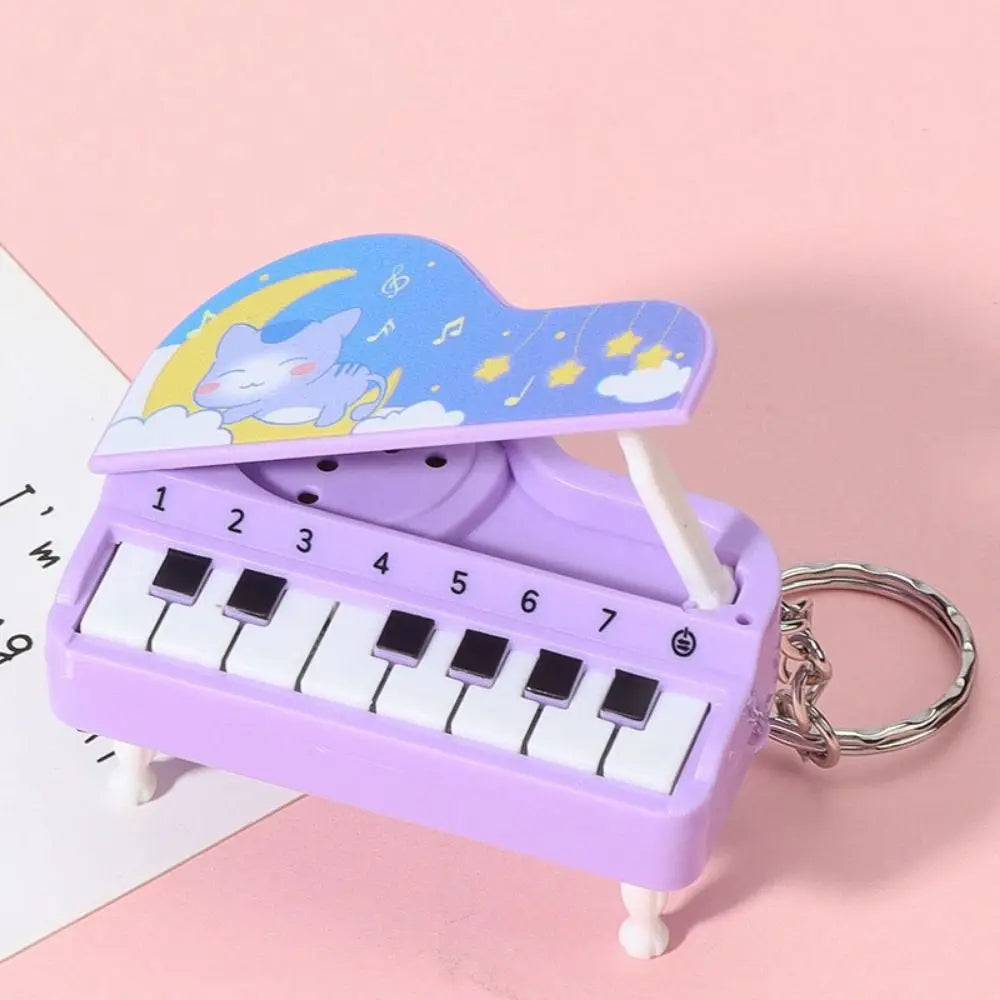 Solid Color Mini Electronic Piano Keychain Bear Rabbit Mini Piano Key Pendant Animals Audible Musical Instrument Piano Keyring Zpaxo purple