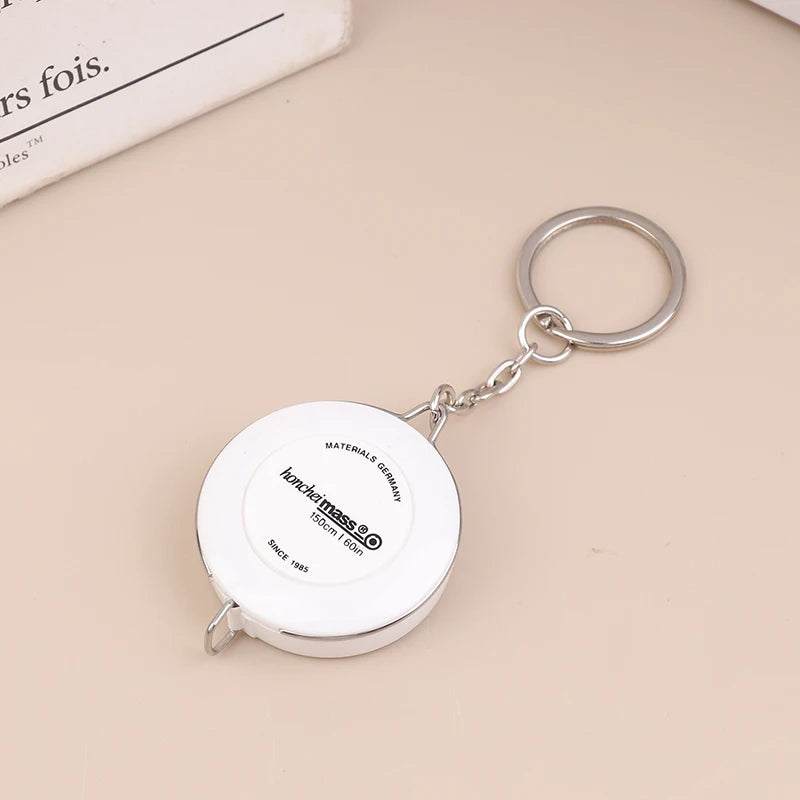 Mini ABS Plastic Measure Ruler Centimeter Inch Roll Tape 150/60Inch Keychain Tape Measure Portable Retractable Measuring Tool Zpaxo White