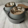 Heavy-duty Modern Elevated Dual Pet Food and Water Bowls • Detachable and Easy to Clean • Space-saving Dual-compartment Feeding Zpaxo As shown