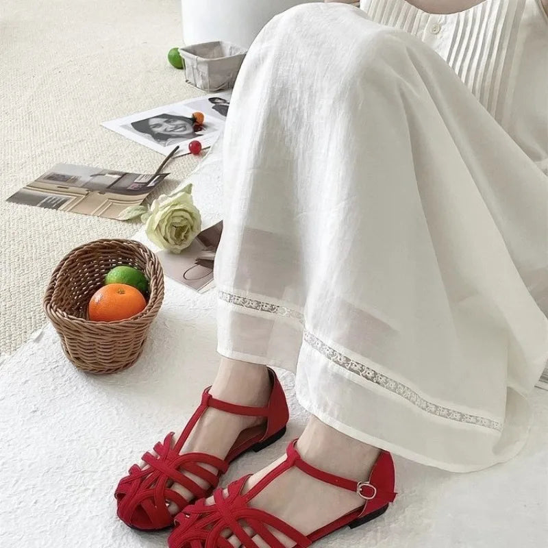 2025 Summer Fashion Weaving Hollow Flat Bottom Baotou Comfortable