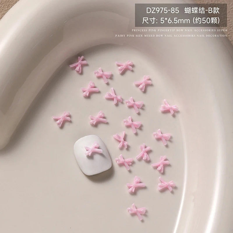 50pcs Sweet Pink Bowknot 3D Nail Art Decorations Mini Resin Ribbon Nail Rhinestones Charms Nail Accessories Manicure DIY Zpaxo B