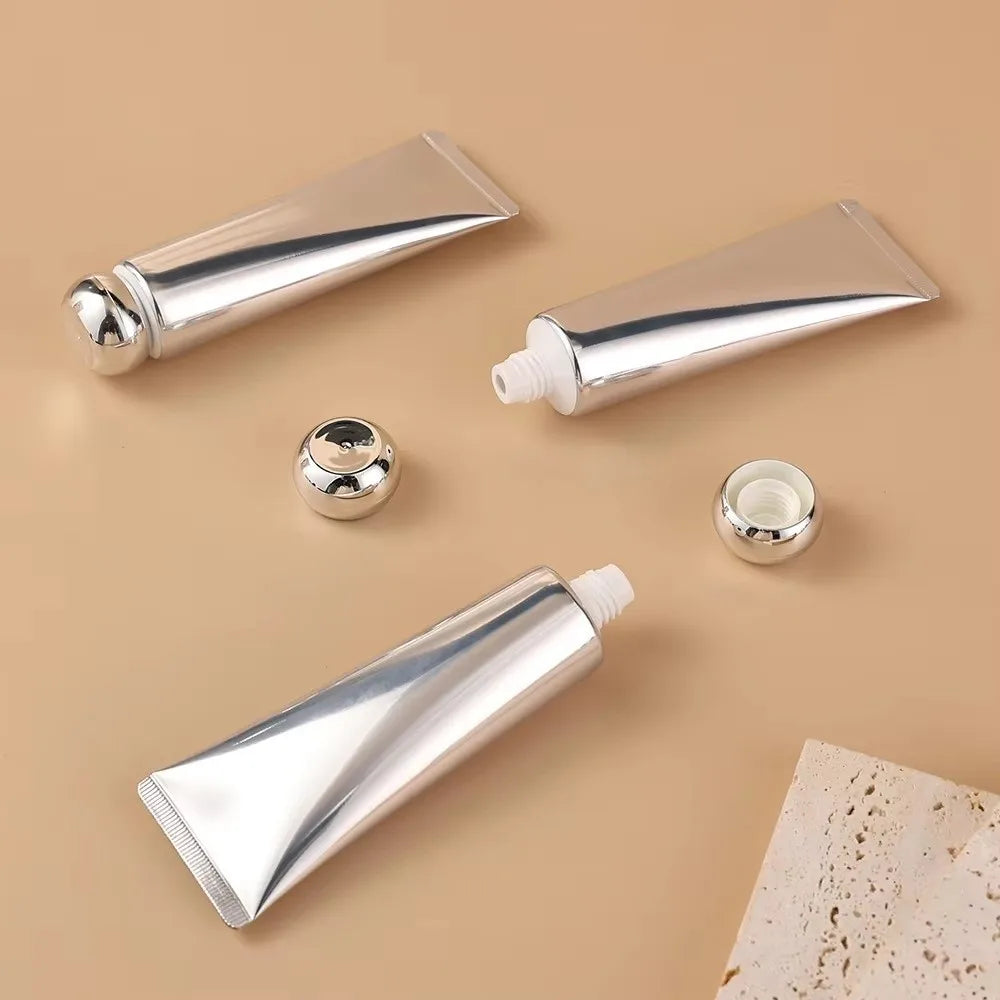 50ml Squeeze Tubes Empty Refillable Travel Bottles Plastic Gold Silver Cosmetic Containers For Facial Cleaner Lotion Hand Cream Zpaxo